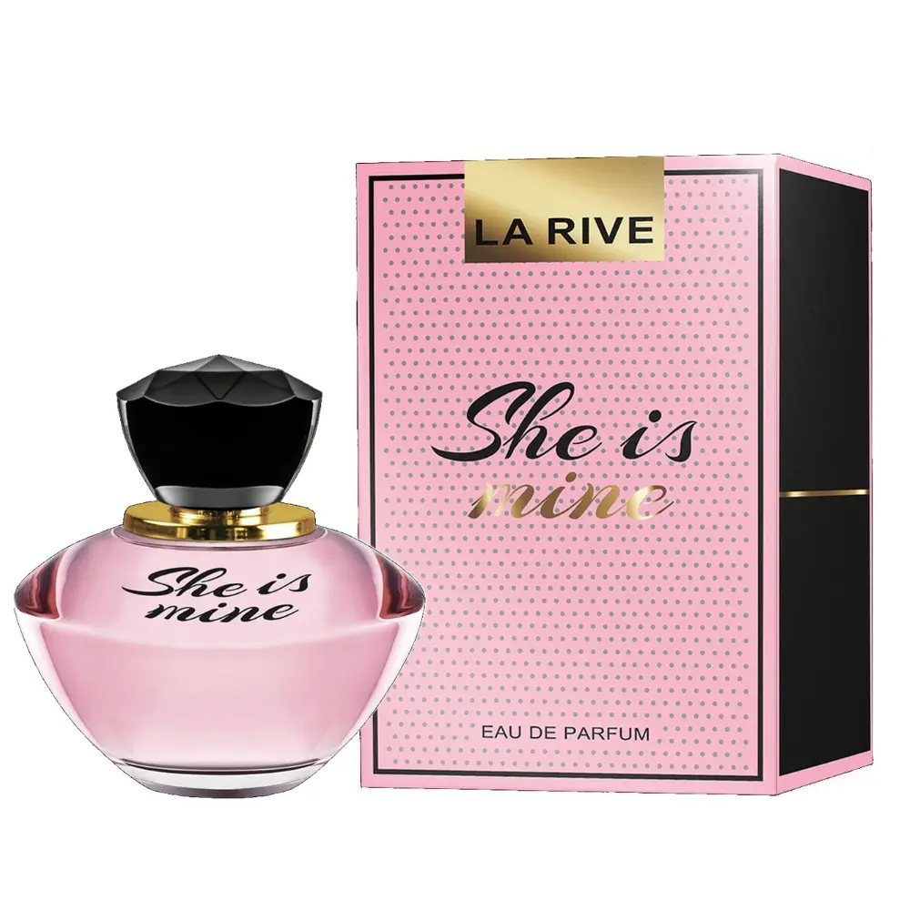 Flacon de parfum LA RIVE pour femmes “She is mine” à côté de son emballage rose.