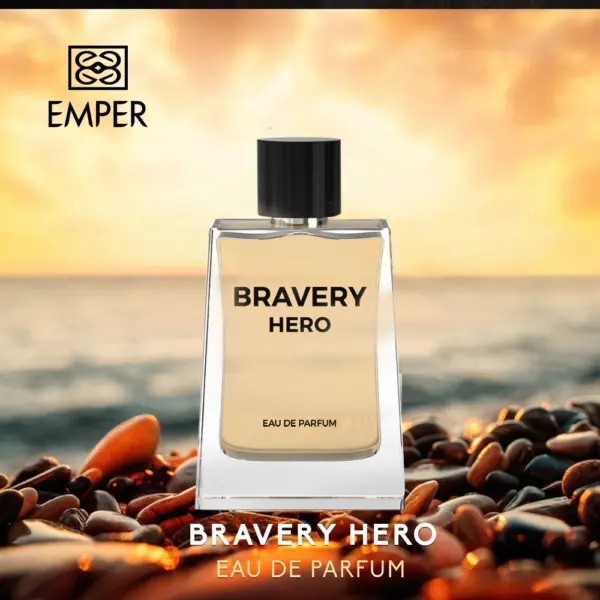 Flacon de parfum EMPER Bravery Hero sur grains de café, coucher de soleil en arrière-plan.