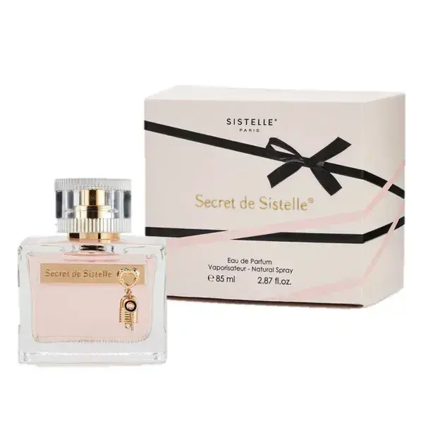 Flacon de parfum “Secret de Sistelle” rose avec clé dorée, boîte élégante blanche et noire, 85 ml.