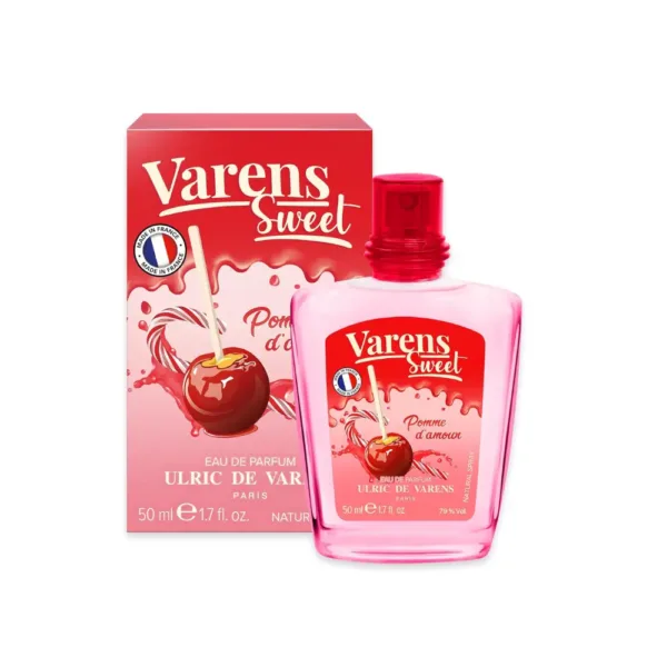 arfum “Varens Sweet Pomme d’Amour” pour femme, flacon rose et emballage avec pommes au caramel et Tour Eiffel.