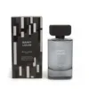 Flacon de parfum Saint Louis Boulevard 100ml avec boîte noire à motifs géométriques blancs, évoquant élégance et modernité.